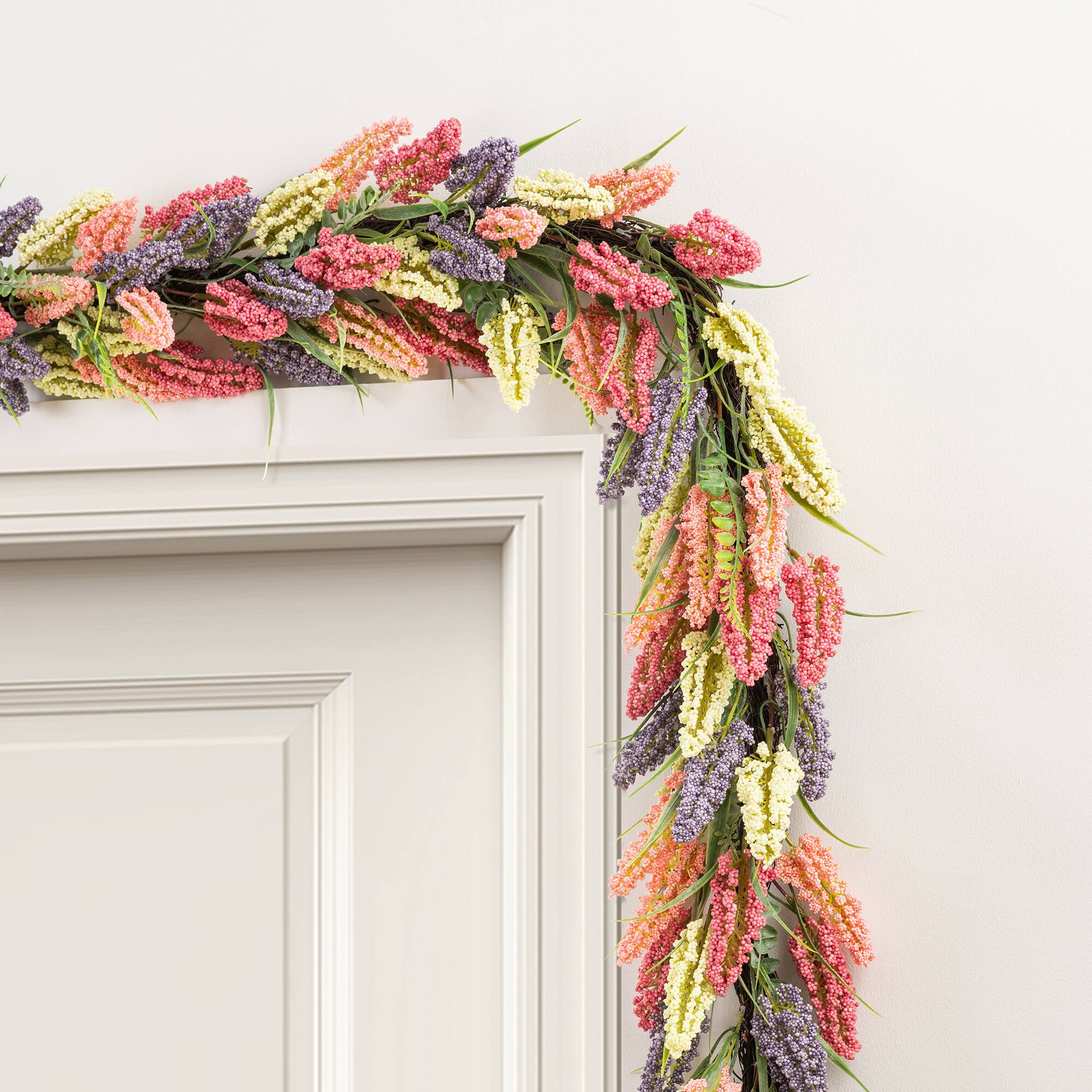 Glitzhome® 6ft. Pink, Purple & Yellow Mixed Heather Garland